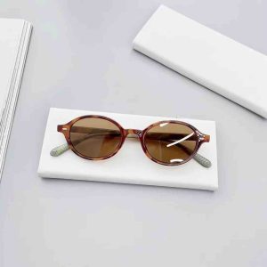Oval tortoise shell sunglasses